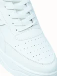 White low-top casual sneakers for men lifestyle view