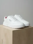 White low-top casual sneakers for men lifestyle view