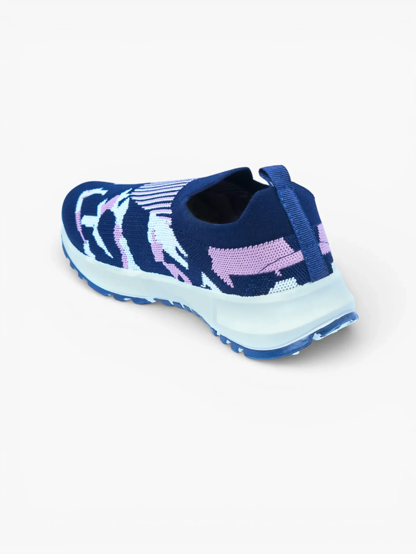 Women’s navy slip‑on sport shoe rear angle Rear angled view of women’s navy slip‑on sport shoe with heel pull tab, pastel knit accents and light cushioned sole.