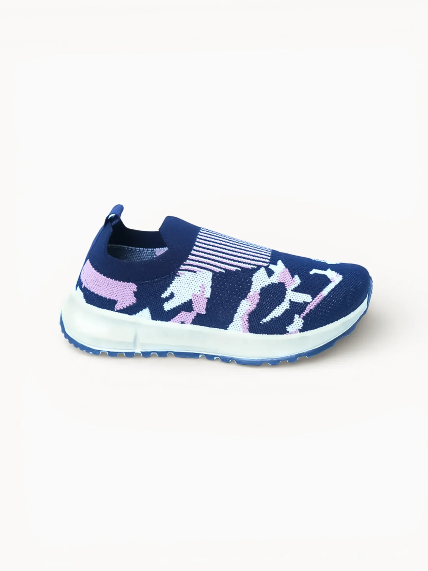 Women’s navy slip‑on sport shoe side profile Side view of women’s navy slip‑on sport shoe with pastel knit upper, light cushioned midsole and blue outsole.